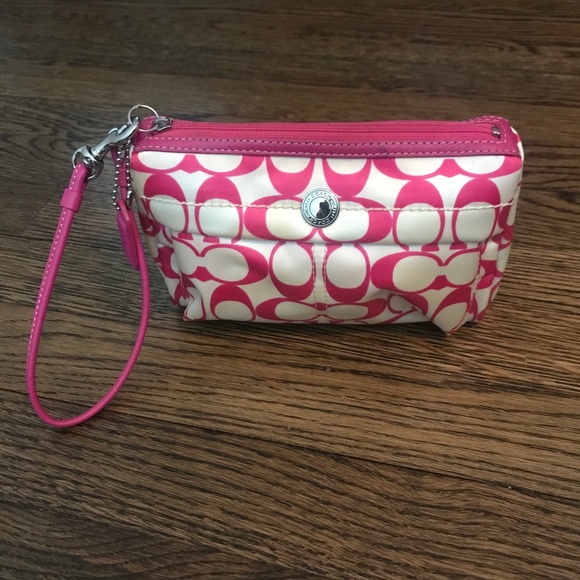 Coach pink and white fabric and leather wristlet